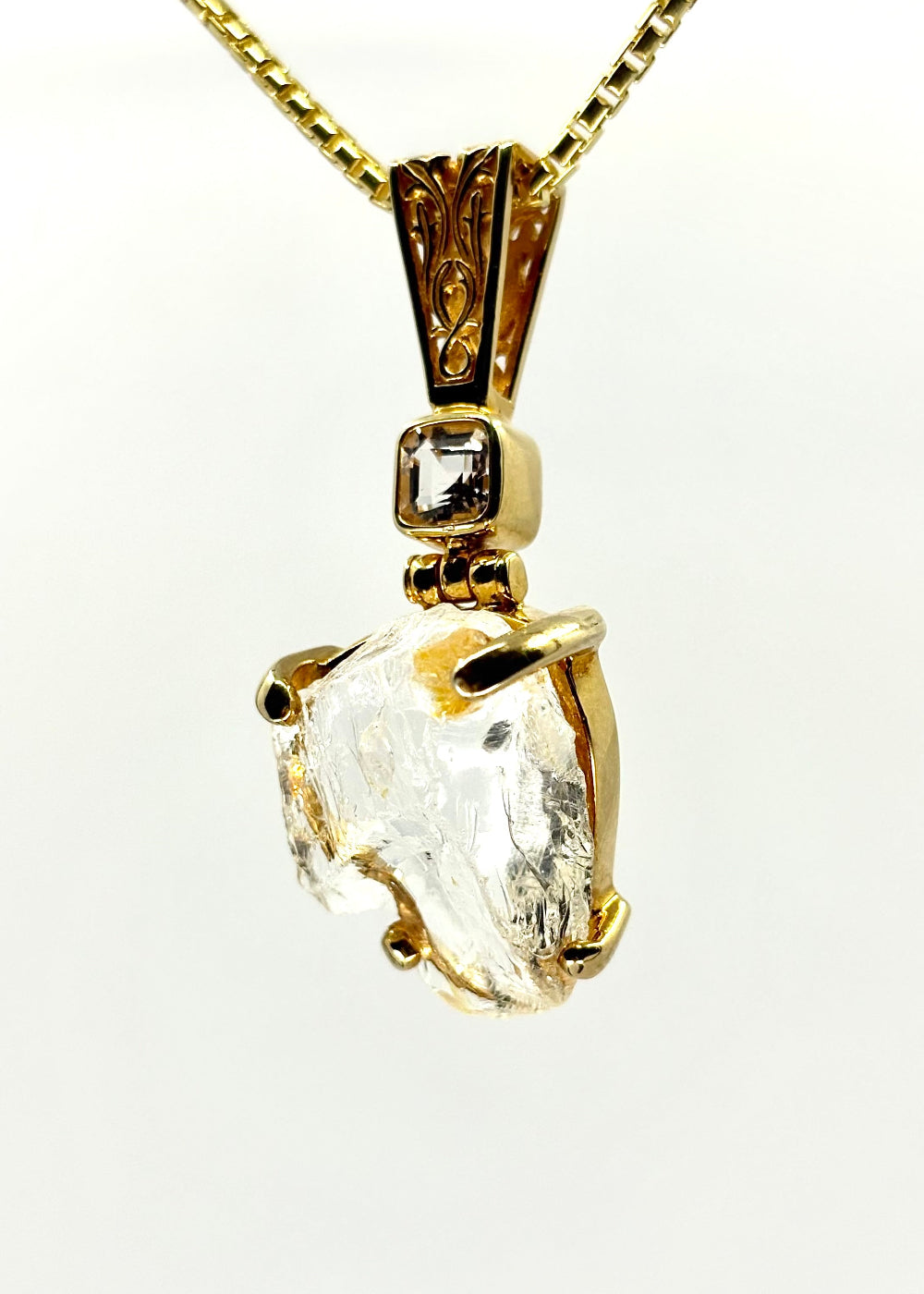 Raw Goshenite pendant 